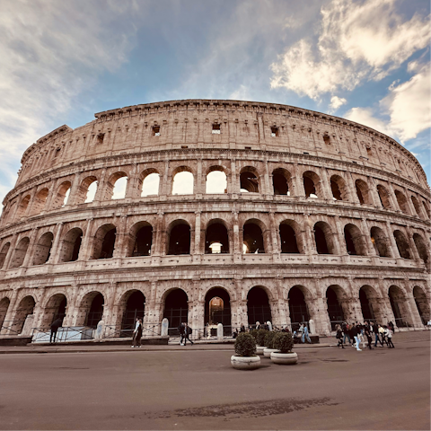 Soak up the history of the iconic Coloseum, thirty-minute bus ride away