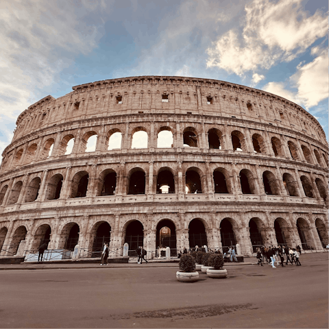 Soak up the history of the iconic Coloseum, thirty-minute bus ride away