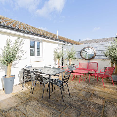Enjoy an evening tipple on the patio before dinner