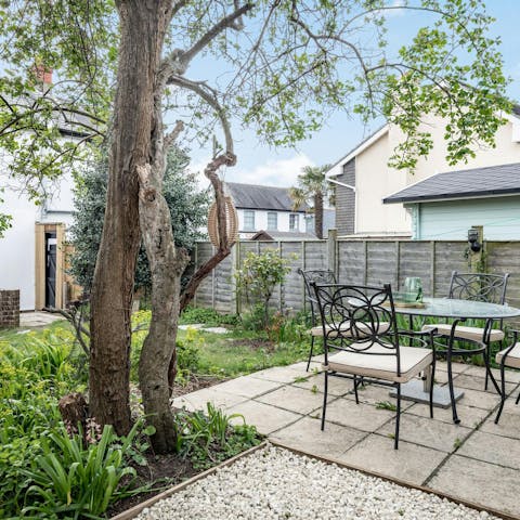 Relax in the garden with space to dine outdoors